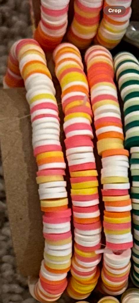 Sherbet Sunset bracelet with pink, orange, yellow, and white striped beads