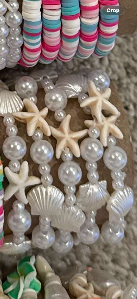 Starry Pearl bracelet with pearl beads, starfish charms, and seashell details