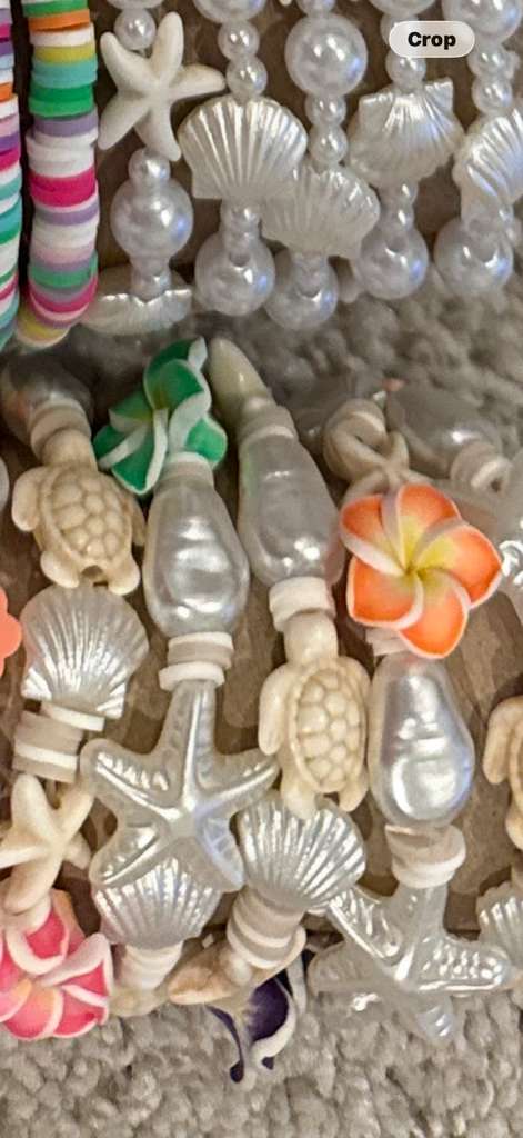 Turtle Blossom bracelet with pearl beads, turtle charms, seashells, starfish, and flower details